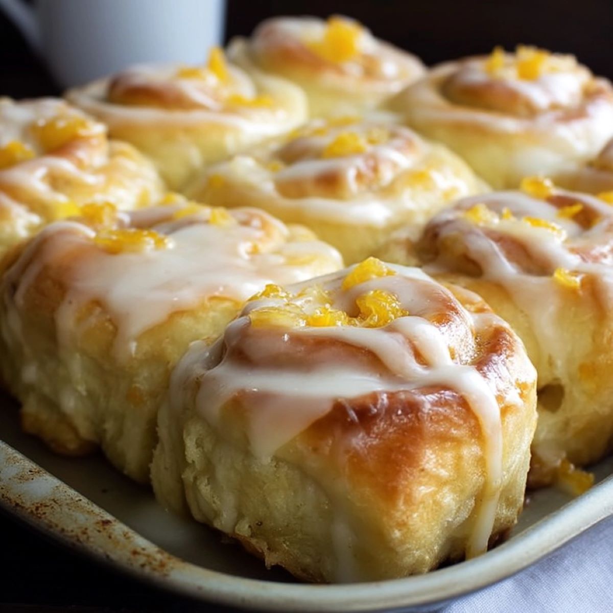 Orange Rolls with a Warm Sour Cream Butter Glaze