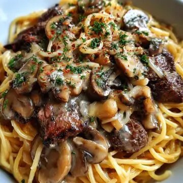 Steak Spaghetti with Mushrooms and Onions in Cream Sauce