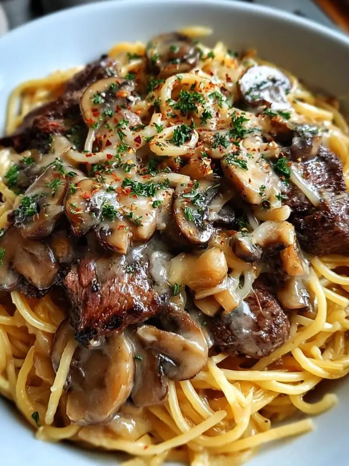 Steak Spaghetti with Mushrooms and Onions in Cream Sauce